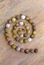 A spiral made of many colorful snail shells