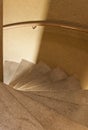 Spiral marble staircase in soft light Royalty Free Stock Photo