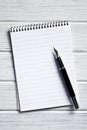 Spiral notebook with fountain pen Royalty Free Stock Photo