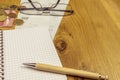 Spiral notebook and pen on wooden desk Royalty Free Stock Photo