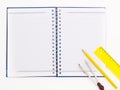 Spiral Notebook with pencil, divider and ruler Royalty Free Stock Photo