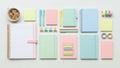 Spiral notebooks journals sticky notes and writing instruments Royalty Free Stock Photo