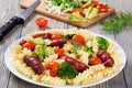 Spiral Pasta salad with broccoli and grilled sausages Royalty Free Stock Photo