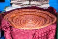 Spiral sausage coil, called srpska domaca kobasica, raw, uncooked, a fresh sausage on dispplay on a Serbian market. Royalty Free Stock Photo