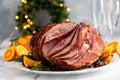 Spiral sliced Christmas ham with orange honey glaze Royalty Free Stock Photo