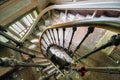 Spiral staircase in an abandoned villa