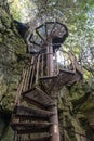 Spiral Staircase Down a Cliff in the Woods Royalty Free Stock Photo