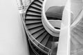 Spiral staircase down in a modern office building. Royalty Free Stock Photo