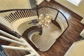 Spiral staircase with foyer view Royalty Free Stock Photo