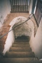 A spiral staircase inside a lighthouse. - vintage film effect