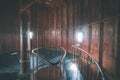 A spiral staircase inside a lighthouse. - vintage film effect