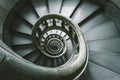 Spiral staircase from a low angle, highlighting the curves and architectural details