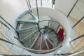 Spiral staircase made of glass and metal in luxury house. Royalty Free Stock Photo