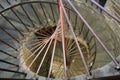 Spiral staircase, rails, grey brick walls, windows in the Saint Isaak Cathedral in Sain Petersburg