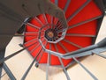 Spiral staircase with red carpet Royalty Free Stock Photo