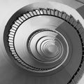 Spiral staircase seen in perspective with the steps going towards infinity Royalty Free Stock Photo