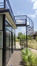 Spiral staircase upstairs, sitting in the middle of the garden