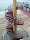 Spiral staircases on the beach of the bay of Cadiz, Andalusia. Spain.