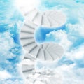 Spiral stairs in sky with clouds and sun Royalty Free Stock Photo