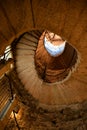 Spiral stone staircase in an old medieval tower Royalty Free Stock Photo