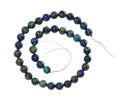 Spiral string of beads from azurite gemstone Royalty Free Stock Photo