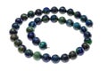 Spiral string of beads from natural azurite gems Royalty Free Stock Photo