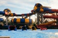 Spiral water slide in the outdoors seasonal aquapark Royalty Free Stock Photo