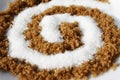 Spiral with white and brown sugar Royalty Free Stock Photo