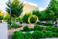 Spiral yellow steel sculpture \'Love Exists\' by John Clement in the sculpture garden, Gene Leahy Mall