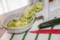 Spiral Zucchini zoodles noodles in spiralizer Royalty Free Stock Photo