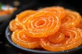 Spiraled sweetness Indian Jalebi, a classic and flavorful dessert Royalty Free Stock Photo