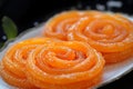 Spiraled sweetness Indian Jalebi, a classic and flavorful dessert Royalty Free Stock Photo