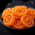 Spiraled sweetness Indian Jalebi, a classic and flavorful dessert Royalty Free Stock Photo