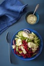 Spiralized beet and cucumber salad with avocado dressing, health