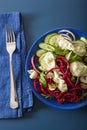 Spiralized beet and cucumber salad with avocado dressing, health