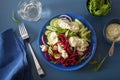 Spiralized beet and cucumber salad with avocado dressing, health