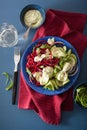 Spiralized beet and cucumber salad with avocado dressing, health