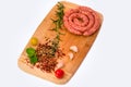 Spiralled, fresh and spicy raw sausages Royalty Free Stock Photo