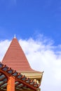 The spire house and clouds