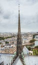 The spire of Notre Dame de Paris, panoramic view of Paris and river Seine from the roof of Notre Dame cathedral, France Royalty Free Stock Photo