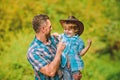 Spirit of adventures. Strong like father. Power being father. Child having fun cowboy dad. Rustic family. Growing cute Royalty Free Stock Photo