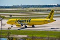 Spirit Airlines aircraft on runway preparing for departure from the Orlando International Airport MCO 1