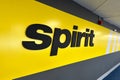 Spirit airlines logo at the New York LaGuardia airport wall.