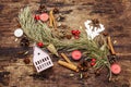 Spirit Christmas background. New Year tree, light house, dog rose, candles, spices, deer, cones. Nature decorations, vintage