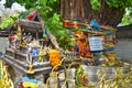 Spirit house and holy tree in Bangkok