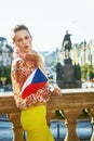 Woman with Czech flag on Wenceslas Square blowing air kiss Royalty Free Stock Photo