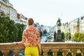 Woman on Vaclavske namesti in Prague Czech Republic looking