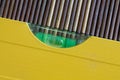 Spirit Yellow level tool close-up, for industrial background or texture Royalty Free Stock Photo