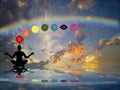 Spiritual background with chakras, human silhouette and rainbow in sea reflection Royalty Free Stock Photo