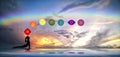 Spiritual background with chakras, human silhouette and rainbow in sea reflection Royalty Free Stock Photo